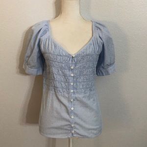 Ana. Size XL. Light blue and white strip.  Puffy sleeves.
